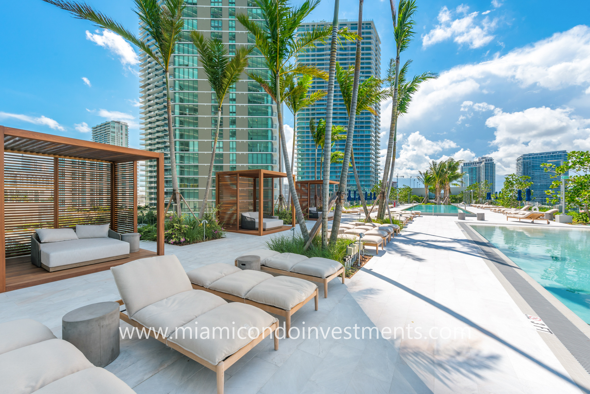 pool deck with cabanas